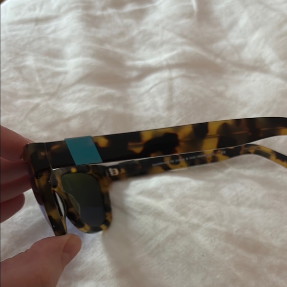 Westward Leaning Tortoise Shell Sunglasses with Blue Lenses - Picture 3 of 5